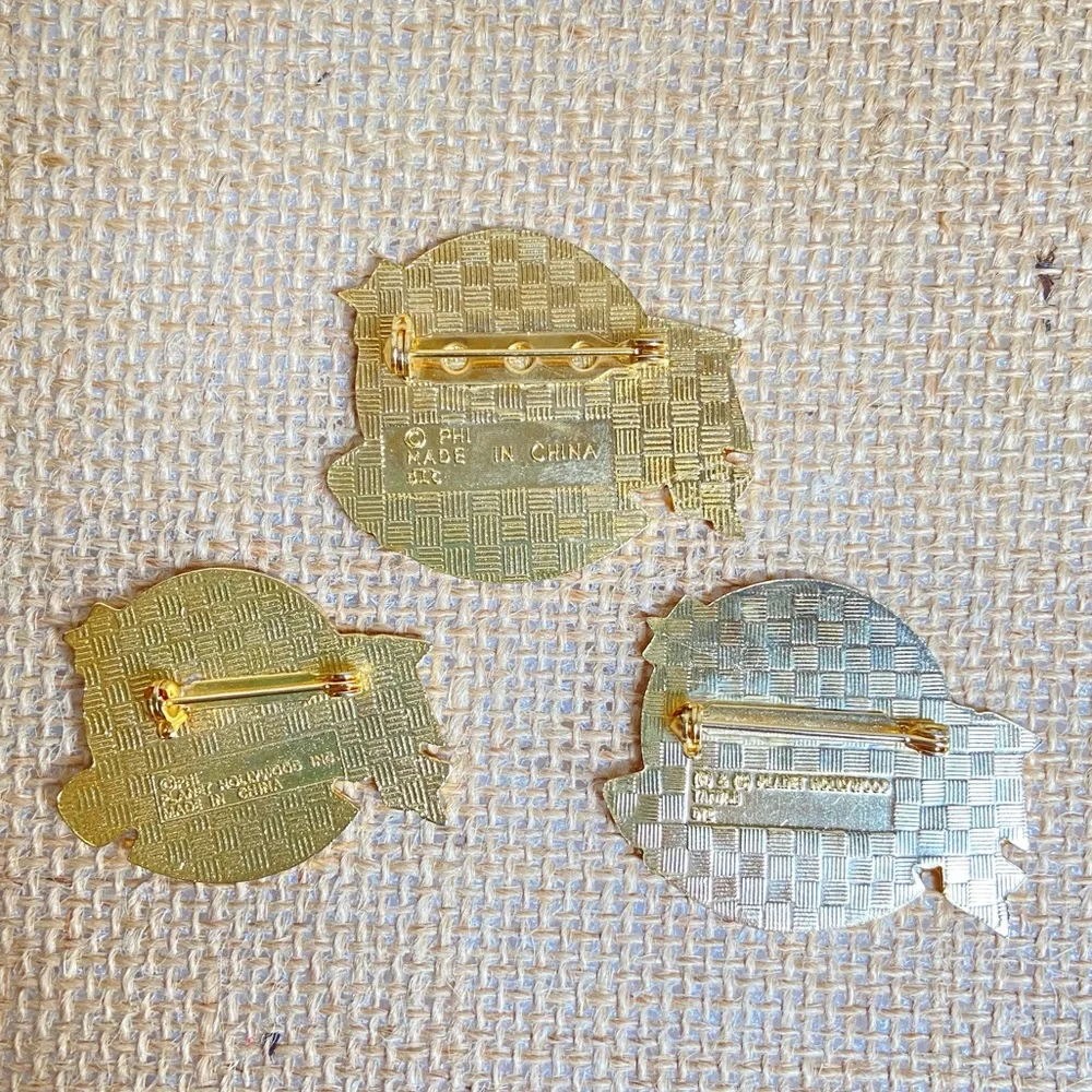 Planet Hollywood Cancun Paris London three pins in enamel over goldtone metal